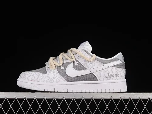 All categories Nk SB Dunk series Nk SB Dunk Low low-top sneakers Nk Dunk Low ESS reverse cashew flower customized version of deconstructed strap casual sneakers DJ9955-100